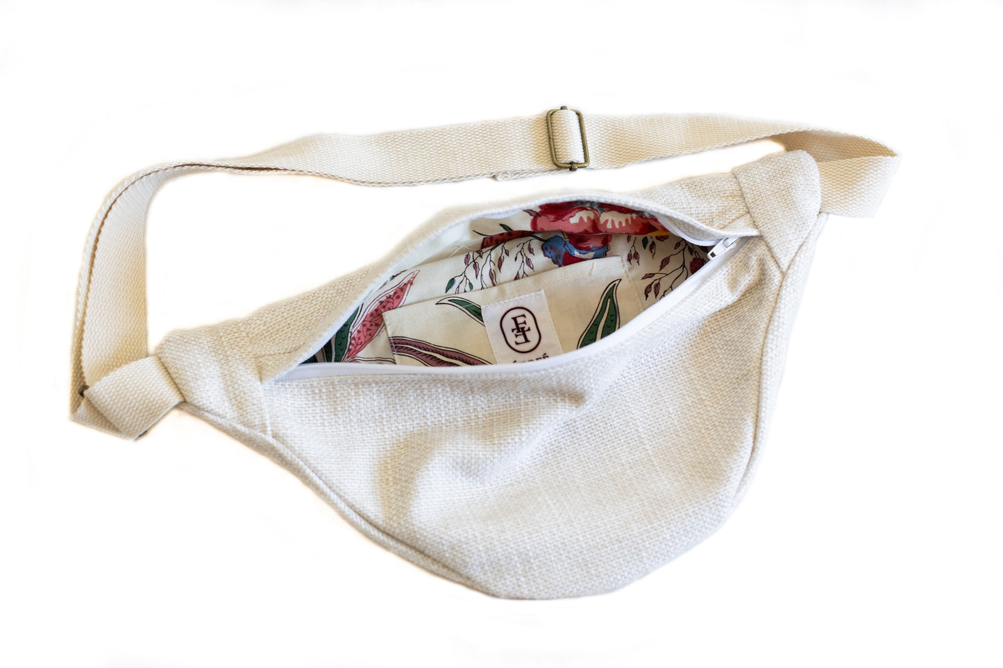 Banane blanche en tissu bouclé avec intérieur fleuri et fermeture éclair blanche, vue de l’intérieur – Étofé.